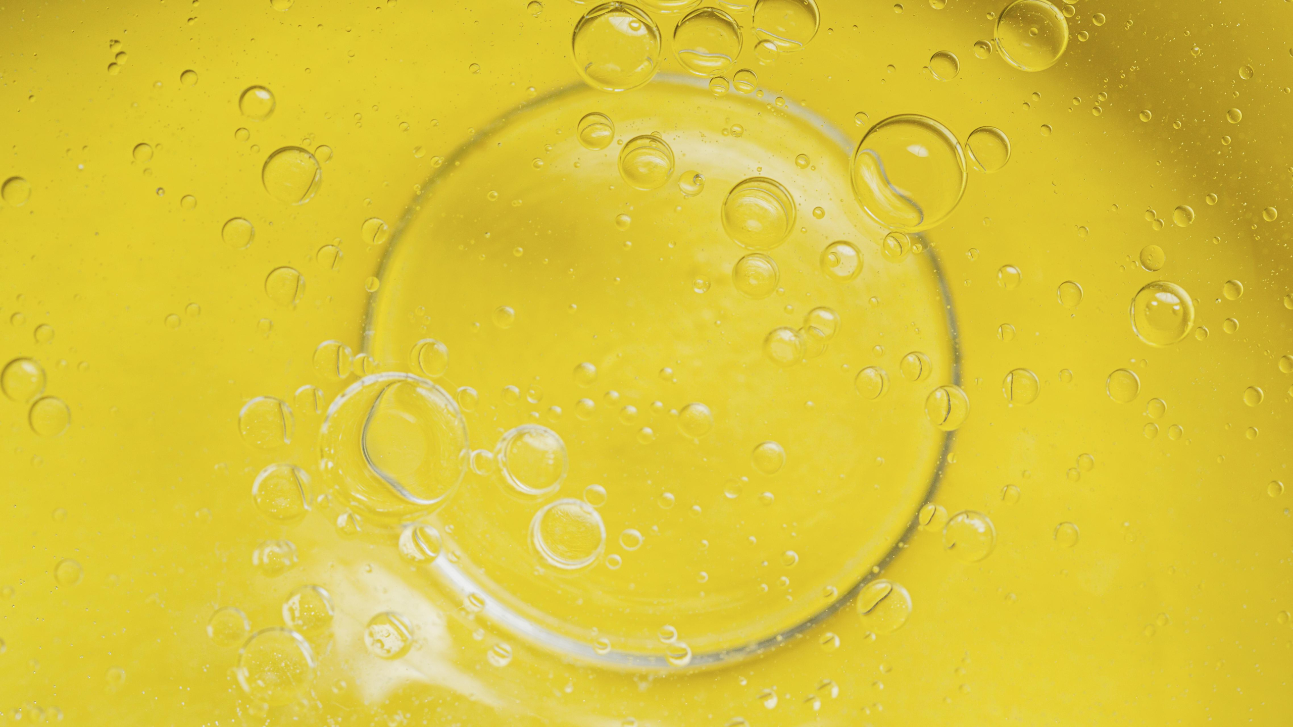 top-view-yellow-liquid-background